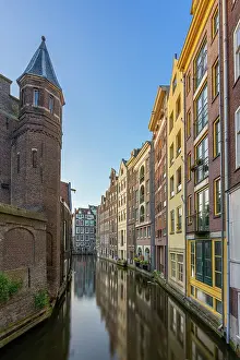 Apartments Prints: Residential buildings and houses amidst Oudezijds Achterburgwal canal against sky