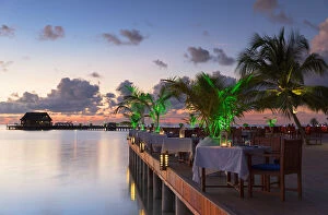 Images Dated 11th May 2016: Restaurant at Olhuveli Beach and Spa Resort at sunset, South Male Atoll, Kaafu Atoll