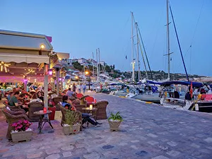 Pythagoreio Prints: Restaurants at the waterfront at dusk