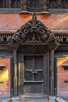 Carved Prints: Restored wooden carved doorway at The Dwarika's Hotel, Kathmandu, Nepal