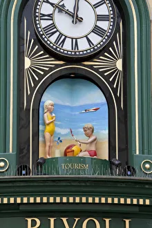 Revolving tableaux on the clock over Rivoli jewellers, St Helier, Jersey, Channel Revolving tableaux on the clock over Rivoli jewellers, St Helier, Jersey, Channel