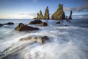 Basalt Rock Prints: Reynisdrangar rock formation in sea near Vik i Mydral, South Iceland, Iceland