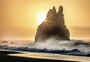Vik Y Myrdal Prints: One of the Reynisdrangar rock stacks at sunrise