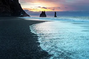 Vik Y Myrdal Prints: The Reynisdrangar rock stacks at sunrise from Reynisfjara black sand beach