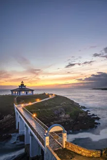 Ribadeo Prints: Ribadeo, Province of Lugo, Galicia, Spain. Illa Pancha lighthouse at dusk