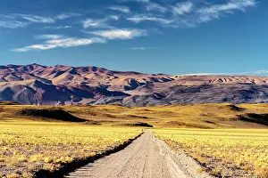 High Altitude Prints: Road crossing the colorful Andean altiplano, Puna, Argentina