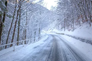Freeze Prints: The road of Raccolana Valley after a snowfall, Julian Alps, Chiusaforte, Udine province