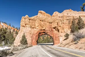 Road through Rock Archway, near Bryce Canyon National Park, Utah, USA