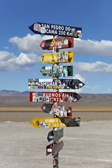 Road Sign Prints: Road signs in the Salinas Grandes'salt flat, Jujuy, Argentina