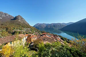 On the rock where there is the ancient chapel dedicated to Our Lady of Sorrows. you can enjoy an excellent panoramic view of the village of Castello across the Valsolda and the Ceresio, Lombardy, Italy. Europe