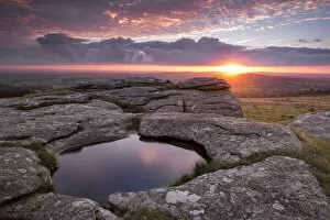 Rock Basin on Kestor at sunrise, Dartmoor National Park, Devon, England