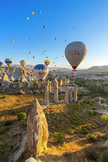 Kapadokya Prints: Rock formations in Love Valley and hot air balloons at sunrise