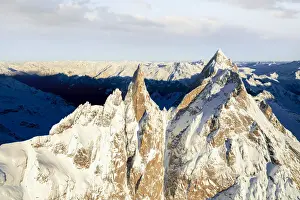 Mountain Ridge Prints: Rock pinnacles of Ago Di Sciora and Pioda Di Sciora peaks at sunrise