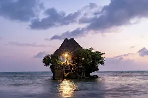 The Rock Prints: The Rock, a small restaurant built on a coral outcrop in the sea off Michamvi Pingwe Beach