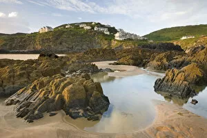 Images Dated 8th April 2022: Rockpools on Combesgate Beach, looking towards Mortehoe, Woolacombe, Devon, England