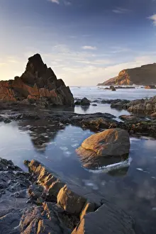 Cornish Prints: Rockpools and jagged rocks at Duckpool beach in North Cornwall, England. Spring