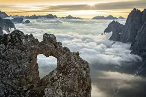 Agordino Gallery: A rocks heart, on a clouds sea, between rock walls. (Dolomites, Italy)