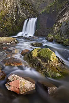 Rocks, stream and waterfall at Spekes Mill Mouth beach in North Devon, England. Spring Rocks, stream and waterfall at Spekes Mill Mouth beach in North Devon, England. Spring