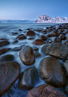 Lofoten Prints: Rocks into the water at Uttakleiv beach at twilight, Leknes, Lofoten, Nordland, Norway
