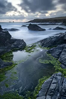 Images Dated 8th December 2021: Rocky seashore of Boobys Bay at dusk, Cornwall, England. Summer (August) 2019