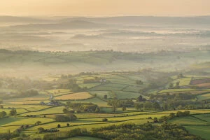 Green Gallery: Rolling countryside at dawn, Brecon Beacons National Park, Powys, Wales, UK