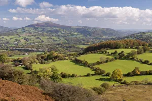 Rolling countryside views towards the Sugarloaf, Brecon Beacons, Powys, Wales. Autumn