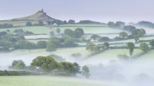 Images Dated 18th May 2016: Rolling mist covered countryside surrounding Brentor Church, Dartmoor, Devon, England