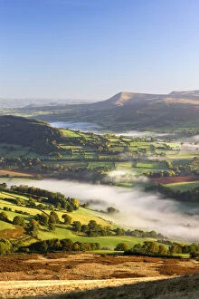 Rolling mist covered farmland in the Usk Valley, Brecon Beacons National Park, Powys