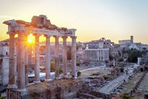 Colosseo Prints: The Roman Forum at sunsrise, with Temple of Saturn in foreground and Colosseum in background