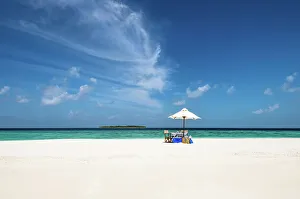 A romantic picnic for two on a deserted sandbank in the Indian Ocean, Baa Atoll, Maldives