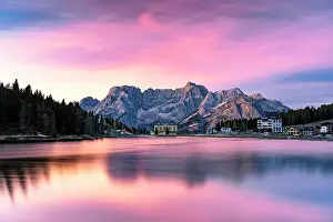 Environment Prints: Romantic pink sky at dawn over lake Misurina and Sorapiss mountain peak in autumn