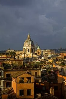 Images Dated 5th March 2008: Rome, Italy; A narrowed overview of rooftops with the St. Peters Basilica Cupola on the horizon