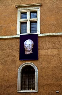 Advert Gallery: Rome, Italy; A Roman statue advertised on the walls of Palazzo Venezia