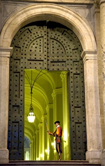 Images Dated 5th March 2008: Rome, Italy; A Swiss guard at the entrance gates to the Vatican