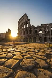 Images Dated 4th July 2015: Rome, Lazio, Italy. Colosseum at summer sunrise