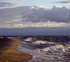 Coast Line Gallery: Rough seas pound Karonga Beach in the early morning