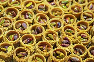 Marketplace Prints: Detail of round traditional Turkish dessert baklava with pistachio nuts