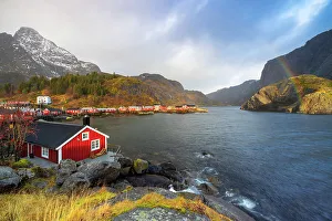 Rorbuer Prints: Rourbuer of Nusfjord at sunset with rainbow