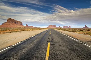 Route 163 with scenic desert landscape, Navajo Nation Indian Reservation, Utah, USA Route 163 with scenic desert landscape, Navajo Nation Indian Reservation, Utah, USA