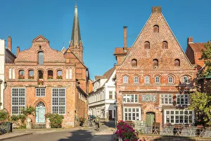 Luneburg Prints: Row of houses at Am Stintmarkt with tavern Pons