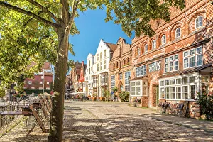 Luneburg Prints: Row of houses at Am Stintmarkt with tavern Pons