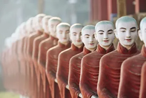 Cave Prints: Row of Monk Statues at Kaw Ka Thawng Cave, Hpa-an, Kayin State. Myanmar, Asia