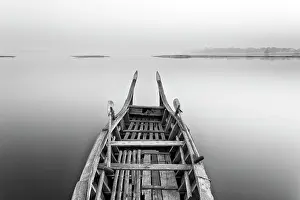 Mandalay Prints: Rowing boat on flat calm Taungthaman Lake, near Mandalay, Myanmar