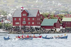 North Europe Gallery: Rowing boats competition in occasion of 'lavsoka festival in the city of Torshavn