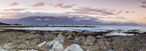 Rugged coastal landscape illuminated at sunset, Kaikoura, South Island, New Zealand Rugged coastal landscape illuminated at sunset, Kaikoura, South Island, New Zealand