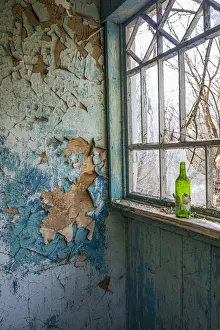 Abandoned Prints: Ruined house in an abandoned village inside the Chernobyl Exclusion Zone, Ukraine