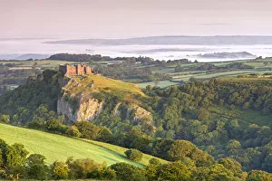 Ruins of Carreg Cennen Castle at dawn in the summer, Brecon Beacons, Carmarthenshire