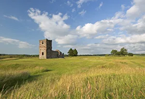The ruins of Knowlton Church surrounded by countryside, Dorset, England. Summer (July)