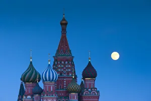 Russia, Moscow, Red Square, Kremlin, St. Basils Cathedral with moonrise Russia, Moscow, Red Square, Kremlin, St. Basils Cathedral with moonrise