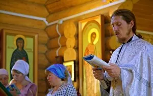 Russia, Sakhalin; An orthodox ceremony in a small church in the suburbs of Yuzhno-Sakhalinsk